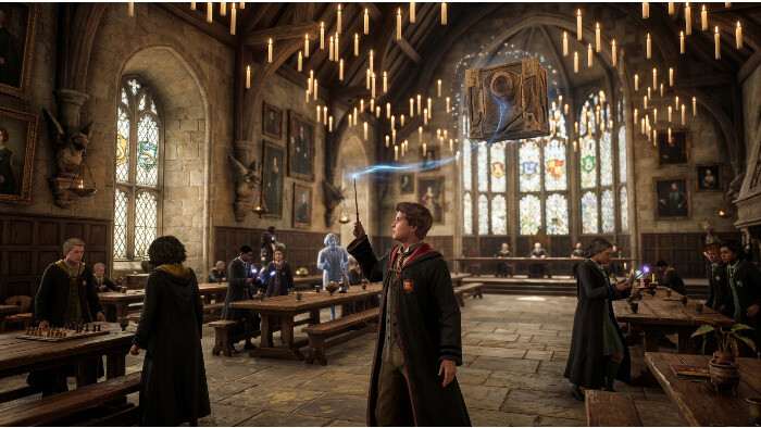 Uitgelichte thumbnail voor Hogwarts Legacy met tovenaar en magische gloed, passend bij mijn speelervaring op PC, PS, Xbox en Switch