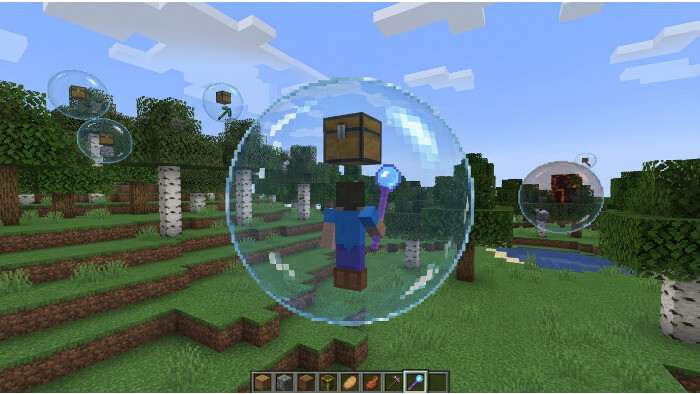 Minecraft: Java Edition thumbnail met Mo' Bubbles update, met loot-bubbels rond items in een blokkerige wereld